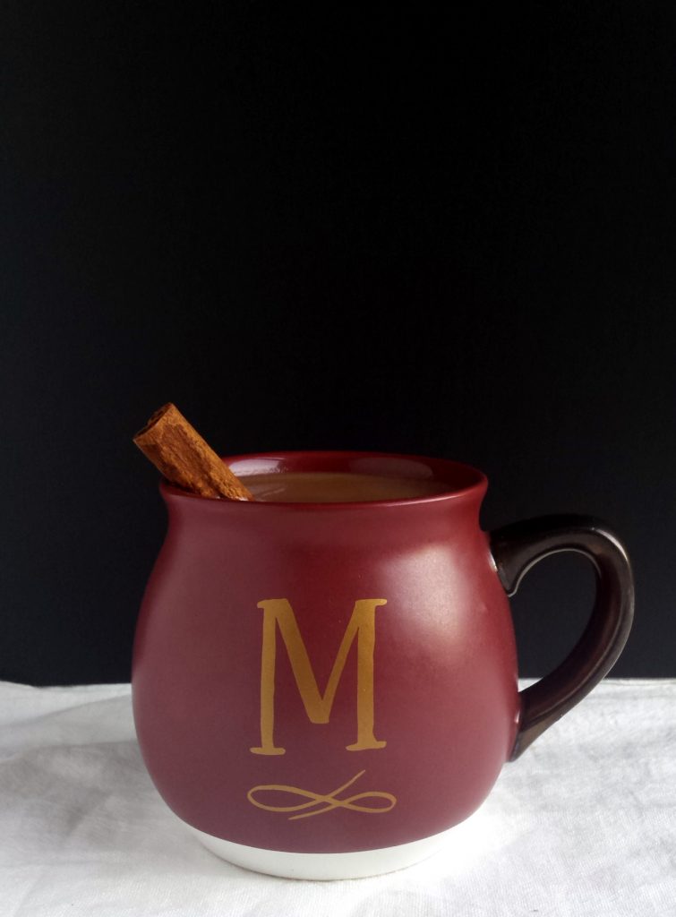 Treat yourself to a mug of Hot Spiced Coconut Apple Cider on a chilly fall evening. #applecider #vegan