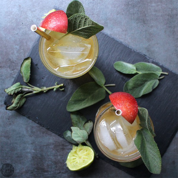 A hard apple cider fall cocktail with smoked sage and a splash of gin is a sweet, herbal combination that's surprisingly refreshing.