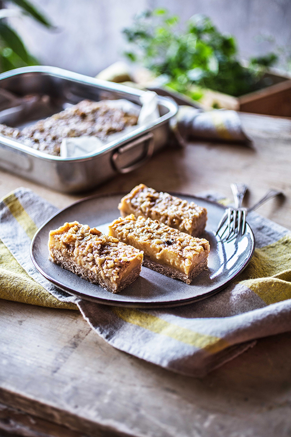 Get your autumn pumpkin fix with vegan Pumpkin Squares from Back to the Cutting Board by Christina Pirello! These treats are perfect for Halloween, Thanksgiving, or anytime you're craving a little something sweet. #vegan #pumpkin #Thanksgiving #Halloween